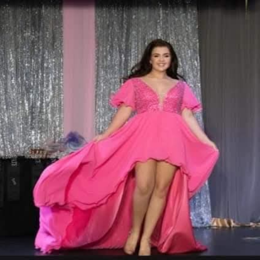 Stunning Pink Gown with Flowing Skirt